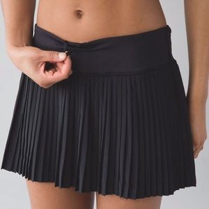 Pleat to the streets lulu skirt